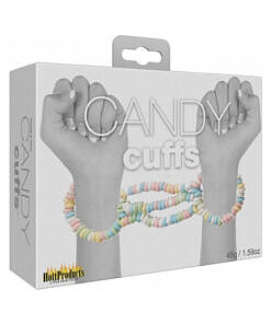 Colorful multi-flavored candy handcuffs resting on a party table