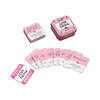 After Dinner Amusements Love Trivia 50 Questions Game box with pastel hearts and question cards on a date night table setting.
