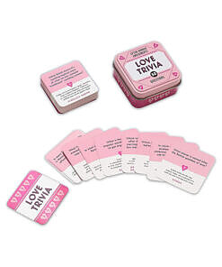 After Dinner Amusements Love Trivia 50 Questions Game box with pastel hearts and question cards on a date night table setting.