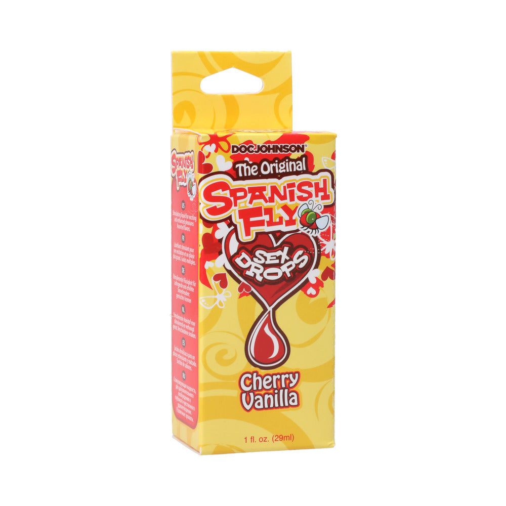 Doc Johnson Spanish Fly Sex Drops Cherry Vanilla 1oz bottle on a white background next to the colorful box.
