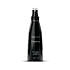 Wicked Cleene Antibacterial Toy Cleaner 4 oz spray bottle misting over translucent surface. Olive leaf and lavender botanical sanitizer.