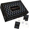 Strip or Tease Game box and contents including guidebook and suggestive dice on a dark
