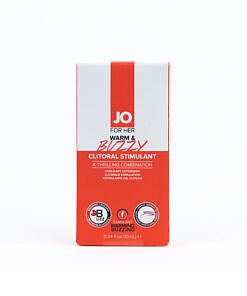 JO Warm & Buzzy Clitoral Stimulant 0.34 oz bottle with pump top on a bedside table.
