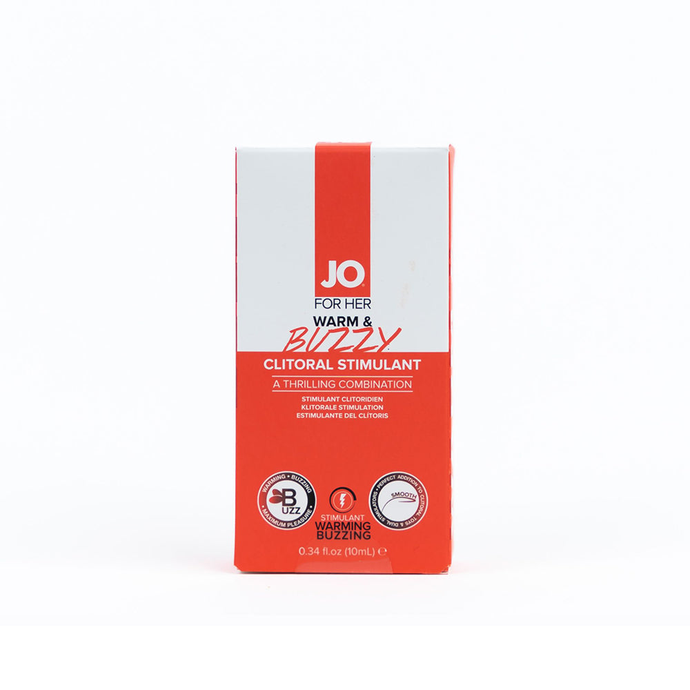 JO Warm & Buzzy Clitoral Stimulant 0.34 oz bottle with pump top on a bedside table.