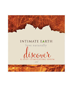 Intimate Earth Discover Gspot 3 ml foil packet displayed on a clean white surface with a subtle drop of gel emerging.