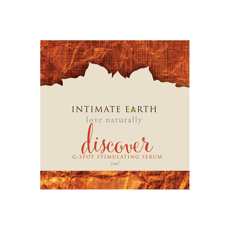 Intimate Earth Discover Gspot 3 ml foil packet displayed on a clean white surface with a subtle drop of gel emerging.