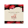 Intimate Earth Wild Cherry 3 ml foil packet held between fingers
