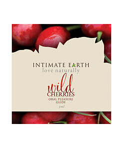 Intimate Earth Wild Cherry 3 ml foil packet held between fingers