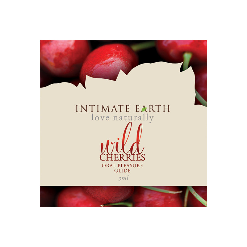 Intimate Earth Wild Cherry 3 ml foil packet held between fingers