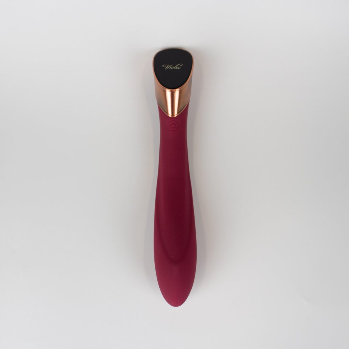 Manto Touch Panel G-Spot Vibrator in wine red silicone with curved tip and touch panel base.
