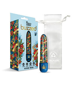 Blue Dream cannabis print 5 inch mini vibrator next to storage bag on zero-waste packaging