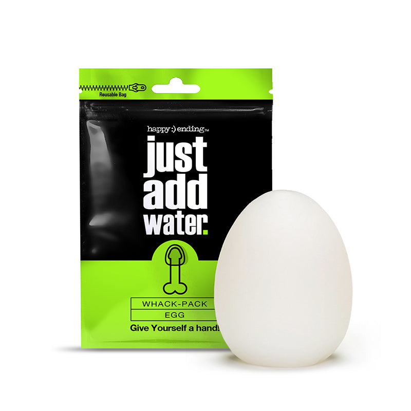 Happy Ending Self-Lubricating Whack Pack egg with frosted sleeve and reversible texture held in hand