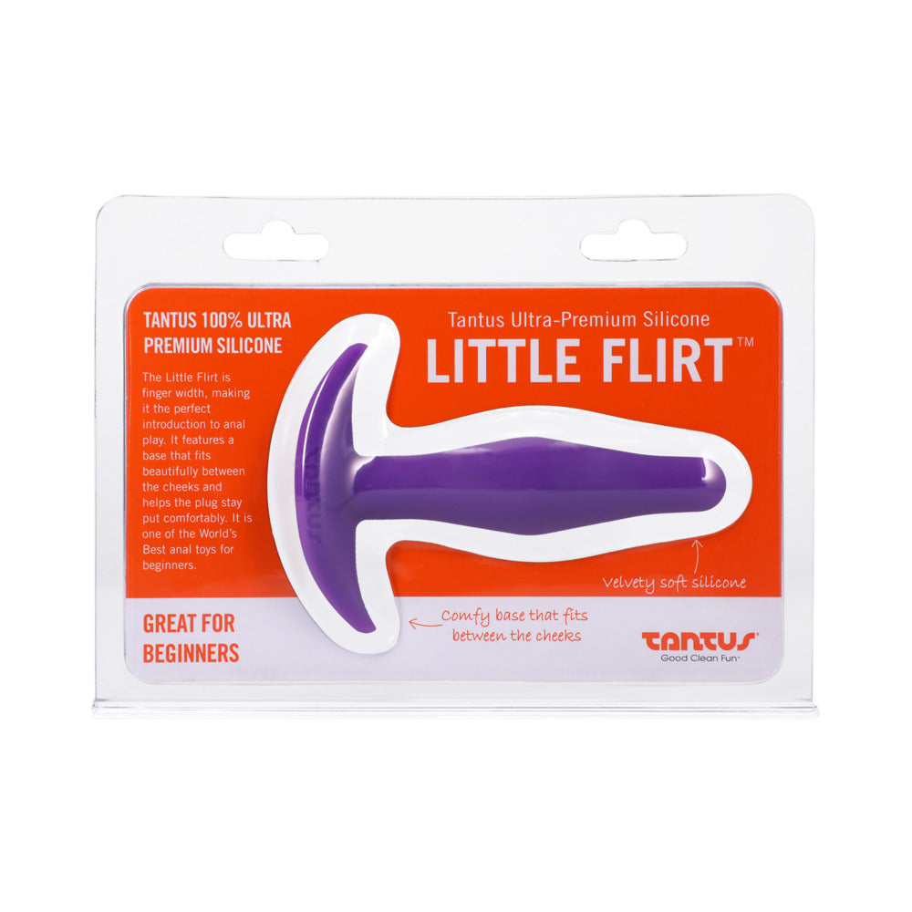 Tantus Little Flirt Anal Plug Lilac - velvety purple silicone beginner plug with tapered shape on lavender background.