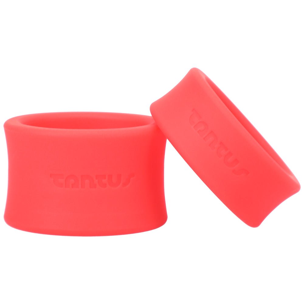 Tantus Ball Stretcher Kit Crimson silicone rings on a sleek white surface