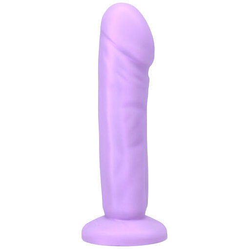 tapered tip and pronounced ridge on dark background.