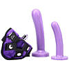 Tantus Bend Over Beginner lavender strap-on kit with adjustable harness and two silicone dildos on white background.