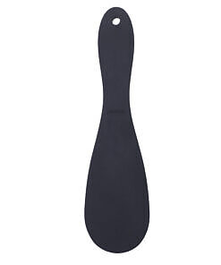 Black oval Tantus Pelt Paddle Onyx with smooth grip handle and hanging loop on a white surface.