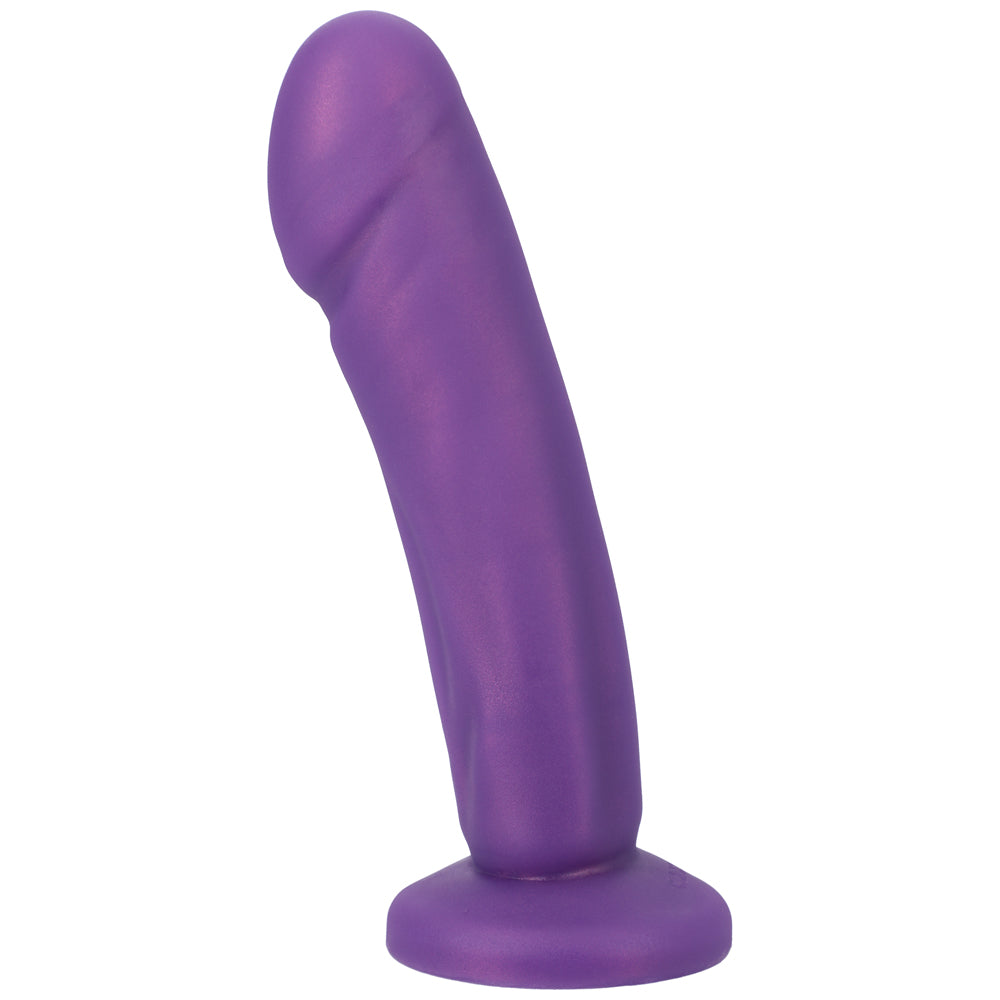 Tantus Vamp Super Soft Dildo Amethyst held against a purple backdrop