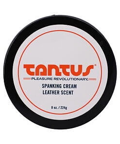 Tantus Apothecary Spanking Cream Leather Scent 8 oz jar with creamy white lotion and subtle leather aroma