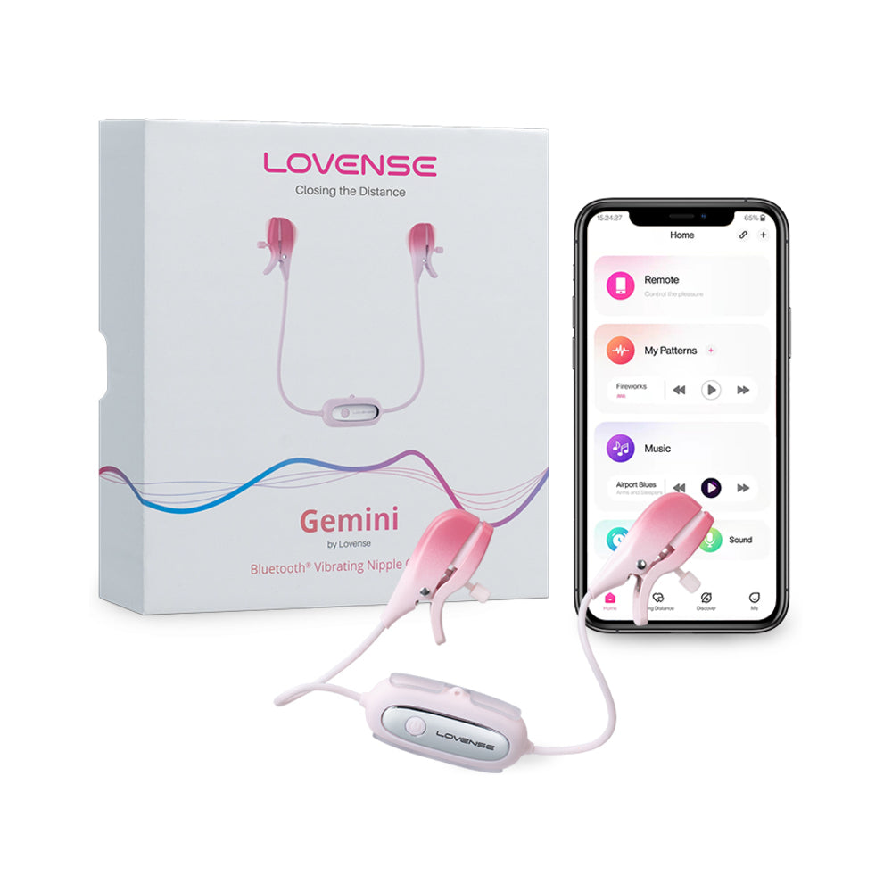 Close-up of Lovense Gemini Bluetooth vibrating nipple clamps with silicone tips and adjustable design on dark background.