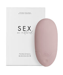 Bijoux Indiscrets Sex au Naturel Vibrating Personal Massager in lavender silicone resting on a linen sheet