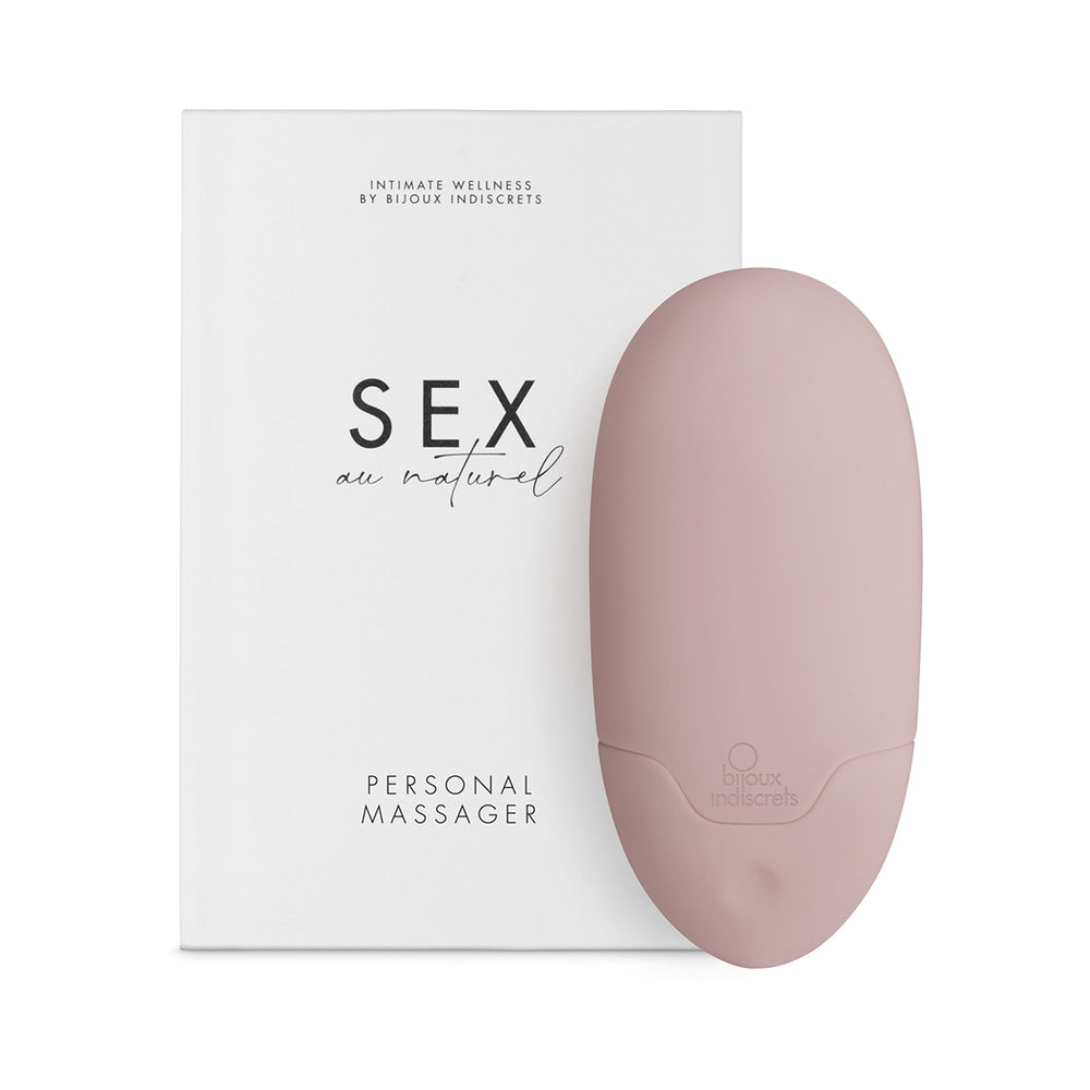 Bijoux Indiscrets Sex au Naturel Vibrating Personal Massager in lavender silicone resting on a linen sheet