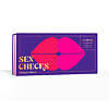 Sex Checks: Spicy or Sweet paperback booklet showing a filled-out check next to a glass of wine and rose petals.