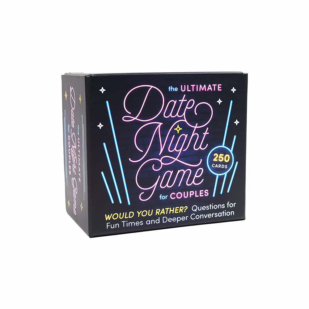 The Ultimate Date Night Game for Couples box beside fanned-out cards on a cozy table setting