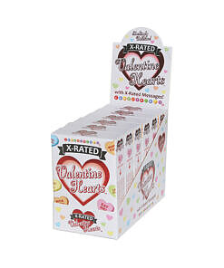X-Rated Valentine Hearts Candy Boxes 6-Piece Display: close-up of colorful heart-shaped candies with risqué text against a red background.