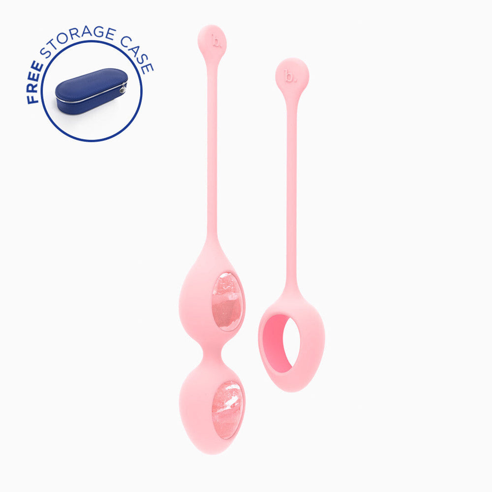 Two polished rose quartz yoni eggs