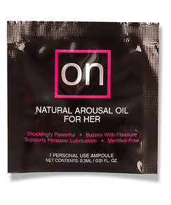 Single-use ampoule packet of Sensuva ON Arousal Oil with botanical formula on a soft silk background.