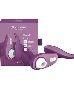 Womanizer Liberty 2 Purple Pleasure Air clitoral stimulator resting inside its hygienic travel case on a neutral background