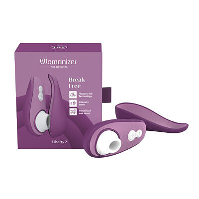 Womanizer Liberty 2 Purple Pleasure Air clitoral stimulator resting inside its hygienic travel case on a neutral background