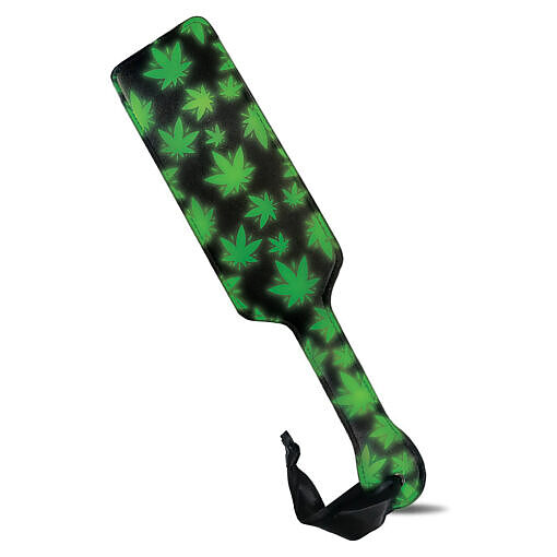 lime green cannabis leaf pattern glowing on a black surface.