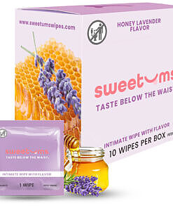 Sweetums Intimate Wipes Honey Lavender 10-pack on a bedside table with soft candlelight
