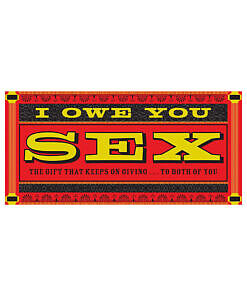 Stack of IOU Sex Gift Coupons booklet with playful favor vouchers on satin sheets.