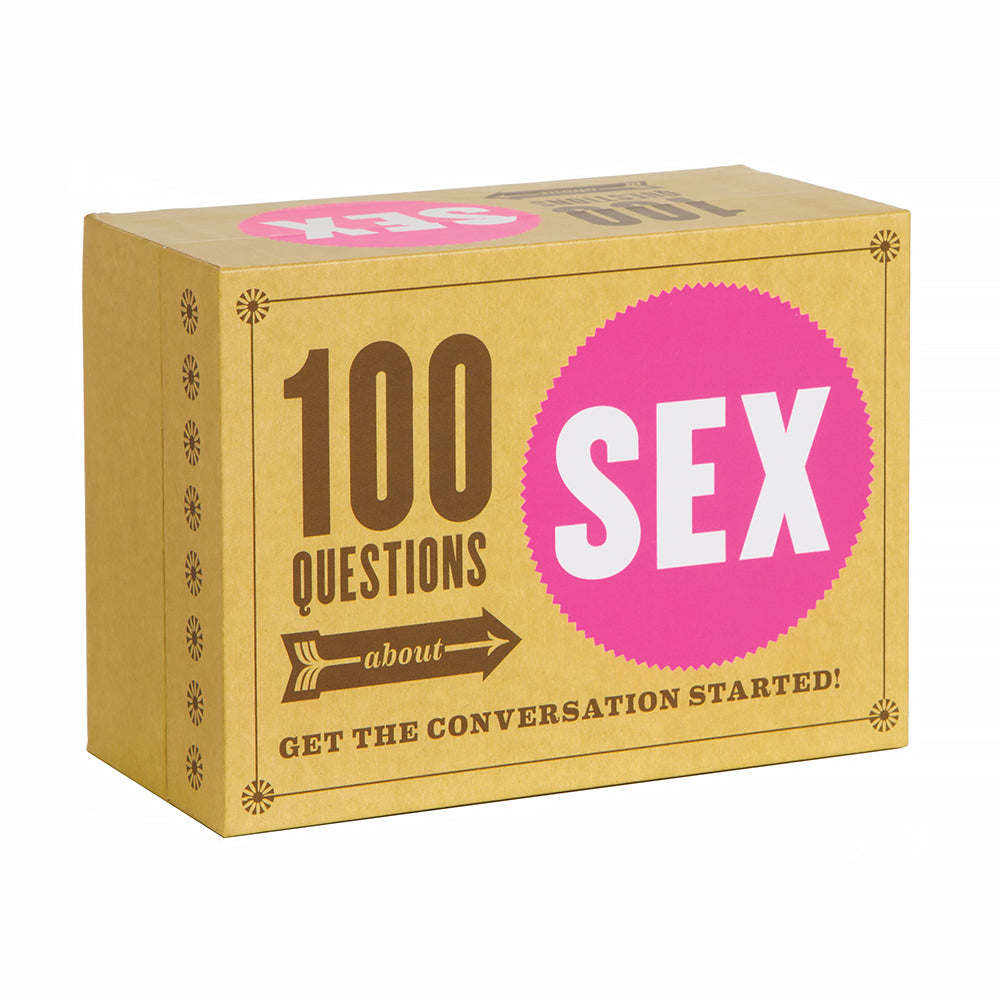 100 Questions About Sex card deck fanned out on a duvet