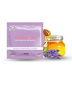 Open packet of Sweetums Honey Lavender Intimate Wipe with soft lavender floral artwork and foil wrapper on white background