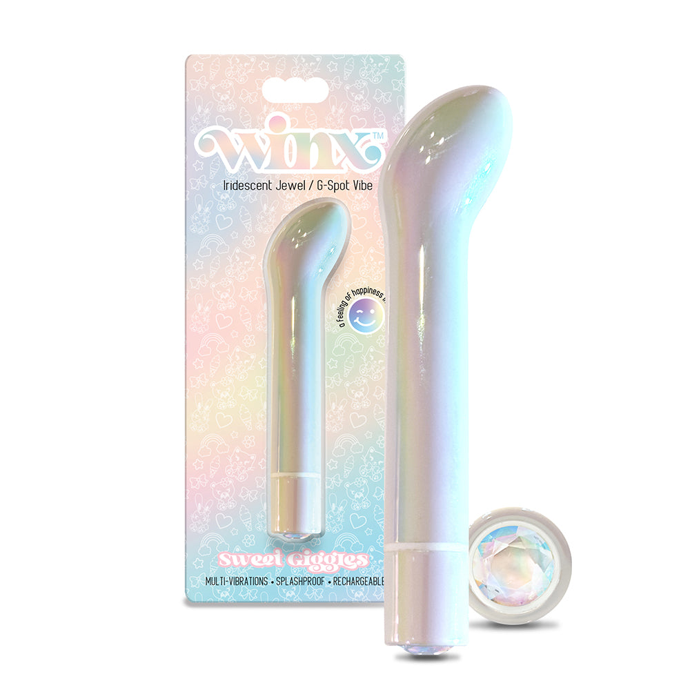 Pink WINX Sweet Giggles G-Spot Vibrator with crystal gemstone tip on a white satin sheet.