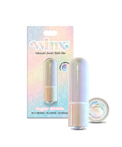 Iridescent WINX Sugar Cookie Bullet Vibrator with gemstone tip next to USB cable on a nightstand.