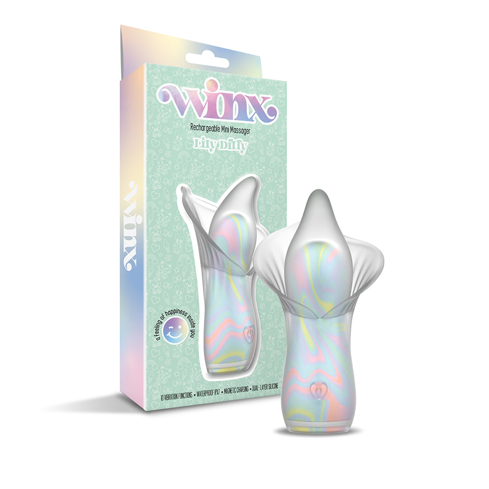 WINX Lily Dilly Squishy Silicone Vibrator in pink with flower petals and charging cable on a soft surface