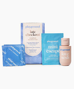 Playground Late Checkout Couples Intimacy Set box with 1 oz serum bottle on nightstand