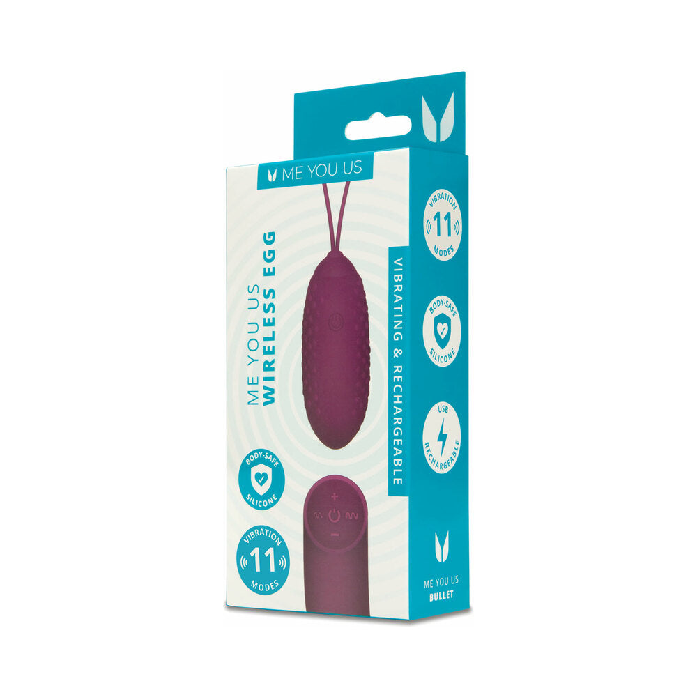 Me You Us Wireless Egg Purple vibrator with remote on a satin sheet