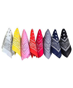 a black cotton handkerchief folded and tucked into the back pocket of jeans
