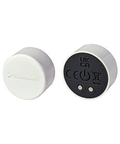 showcasing its tiny 1-inch size.