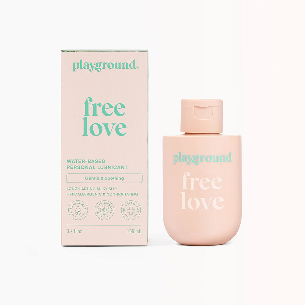 Playground Free Love Extra-Gentle Water-Based Personal Lubricant 3.7 oz tube on a clean bathroom shelf