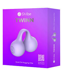 Lilac SVibe Snail Twinn finger vibrator with dual tips and charging case on a soft surface