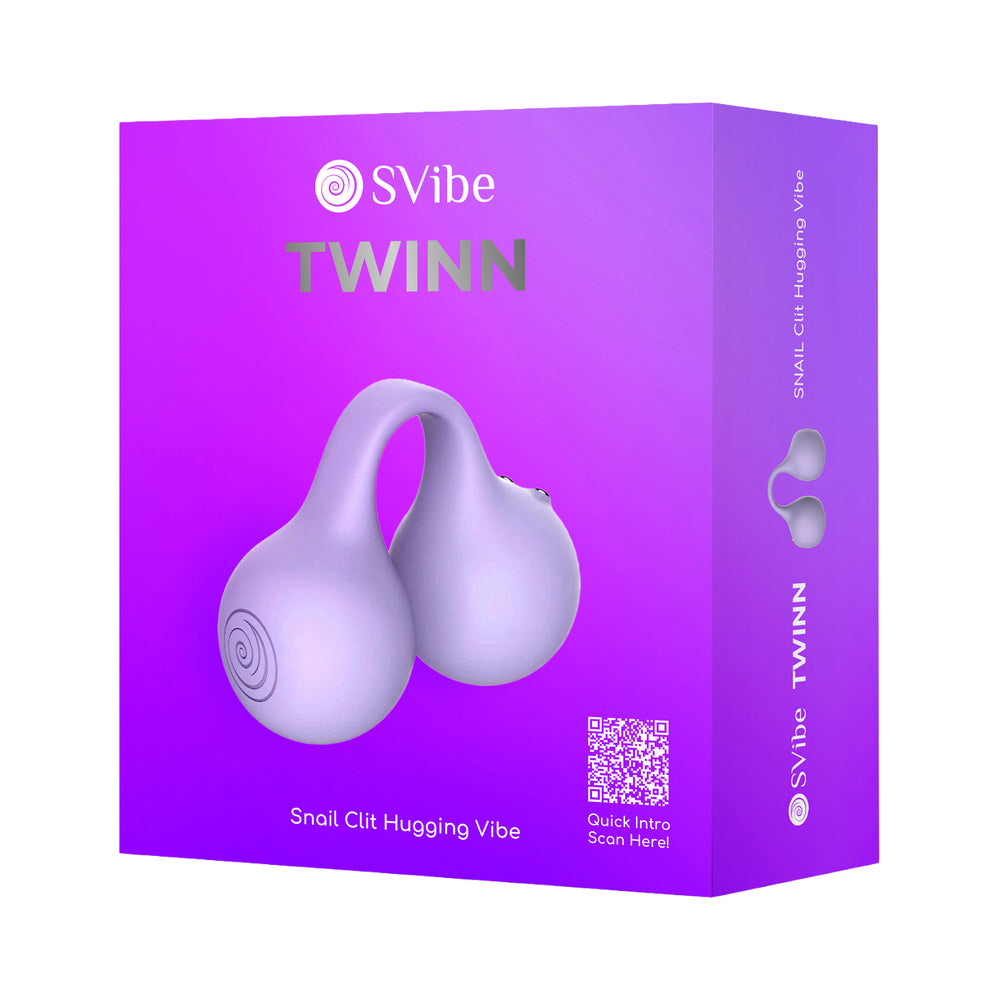 Lilac SVibe Snail Twinn finger vibrator with dual tips and charging case on a soft surface