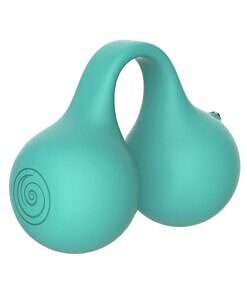 dual silicone tips and finger band resting on a muted surface.