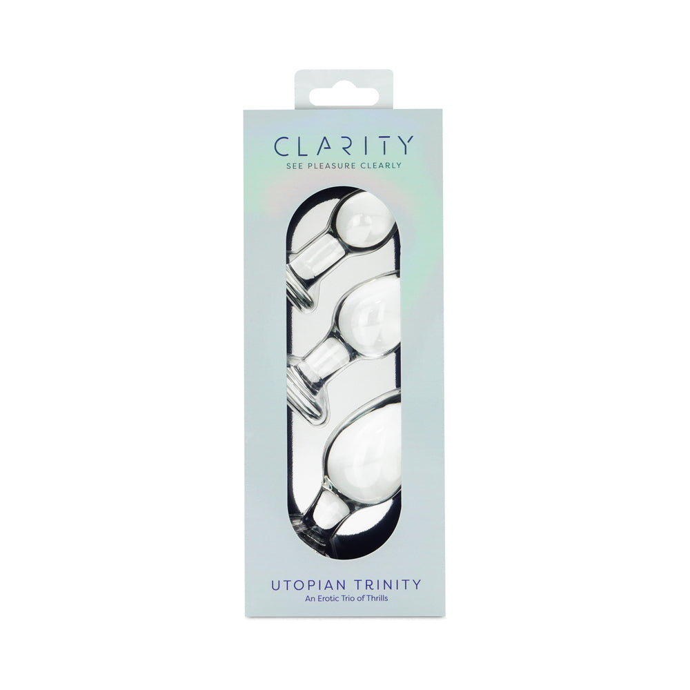 Clarity Utopian Trinity Glass Plug Set - three clear borosilicate glass plugs in graduated sizes displayed on a soft surface.